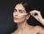 model applying collagen serum
